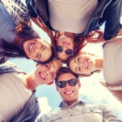 depositphotos 47933691 stock photo group of teenagers looking down